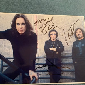 Black Sabbath Ozzy Osbourne , Tony Iommi & Geezer Butler Autographed/Signed  8X10 Photo RA COA