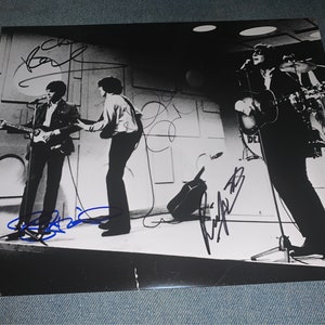John Lennon, George Harrison, Paul McCartney and Ringo Starr of The Beatles Signed Autographed 8x10 B&W Photo Rare Item COA