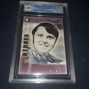 May include: A hockey card featuring Bill Barber, a left wing for the Philadelphia Flyers. The card is from the 2004-05 In The Game Heroes and Prospects series. The card is graded 10 by the Great Canadian Sports Collectors Association.