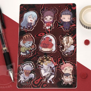 May include: A sheet of stickers featuring various characters from the anime "The Ancient Magus' Bride" on a red and black background with a swirling pattern. The characters include Chise, Elias, Ruth, Nevin, and others.