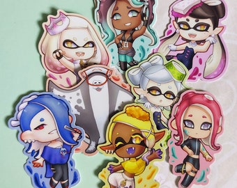 以下が含まれることがあります： ビデオゲーム「スプラトゥーン」のキャラクターをフィーチャーした、カラフルな漫画キャラクターのステッカー10枚セット。ステッカーは透明な背景に印刷されており、あらゆる表面に楽しいアクセントを加えるのに最適です。