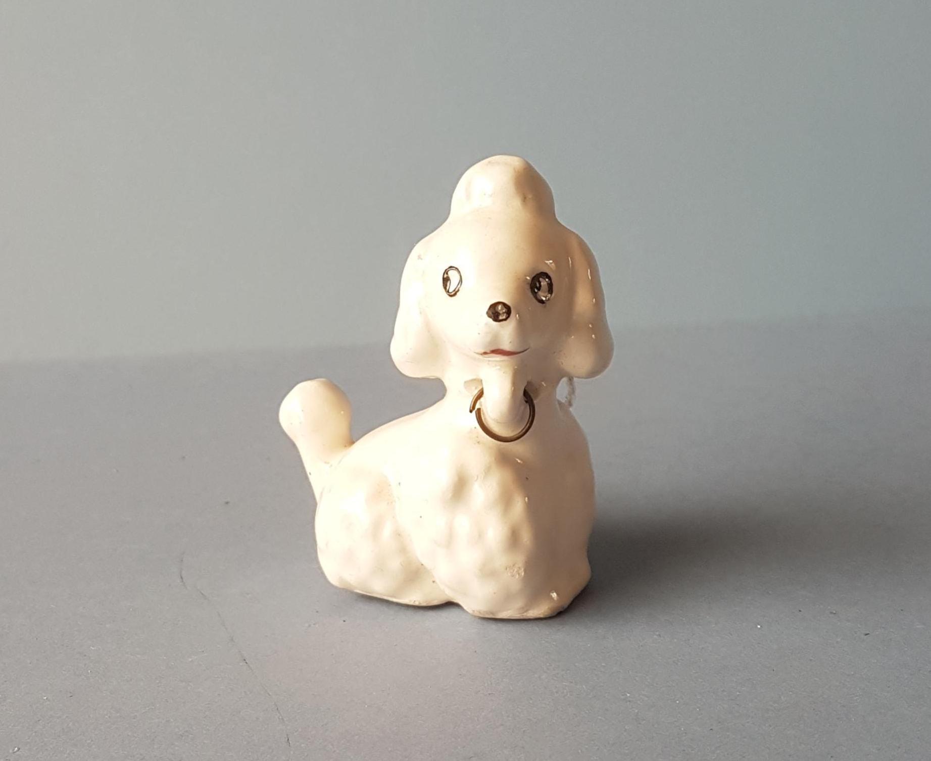 1950年代50's 陶器製アンティーク　プードル貯金箱 ヴィンテージの小さな陶器製プードル、犬、1950年代 - Etsy 日本