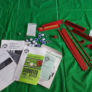 vintage 70s subuteo table football pitch, parts spares, paperwork