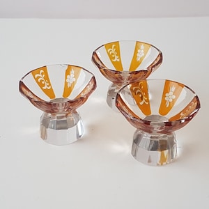 antique 1930s czech bohemian liqueur glasses, 3 amber cut glass overlay, in the style of karl palder