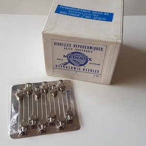 box of vintage hypodermic needles, syringe, 1950s. medical collectable, medinox