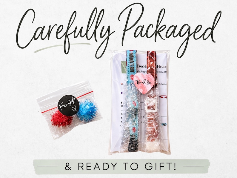 a carefully packaged gift with a note that says "Carefully Packaged & READY TO GIFT!" The gift includes a small bag of red and blue pom poms, a package of what appears to be a watch, and a note that says "Two Heart".