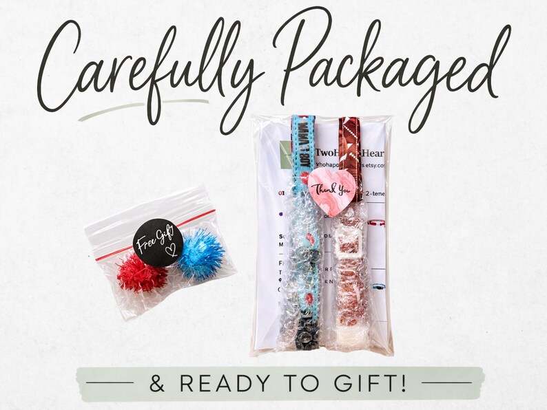 a carefully packaged gift with a note that says "Carefully Packaged & READY TO GIFT!" The gift includes a small bag of red and blue pom poms, a package of what appears to be a watch, and a note that says "Two Heart".