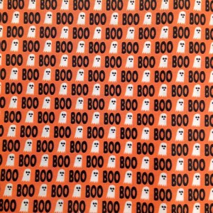a repeating pattern of the word "BOO" in black text against an orange background, with each "BOO" being accompanied by a white ghost.