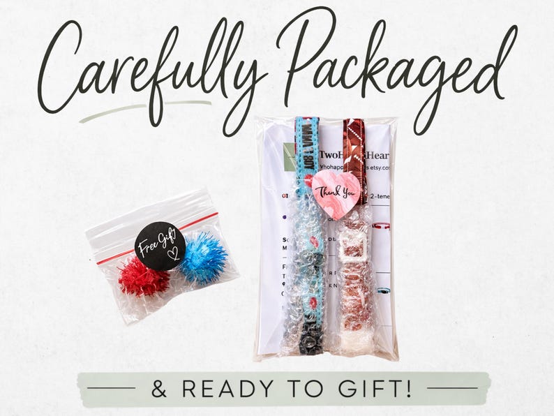 a carefully packaged gift with a note that says "Carefully Packaged & READY TO GIFT!" The gift includes a small bag of red and blue pom poms, a package of what appears to be a watch, and a note that says "Two Heart".
