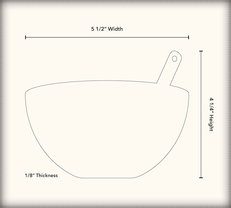 May include: A white ceramic bowl with a handle, measuring 5 1/2 inches wide and 4 1/4 inches high. The bowl is 1/8 inch thick.