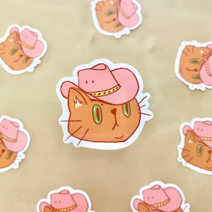 Sticker chat cowboy Pudge - Sticker cowboy - Stickers roses - Papeterie chat - Stickers esthétiques - Art inspirant - Ordinateur portable cow-girl