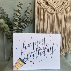 Cartão de aniversário confete