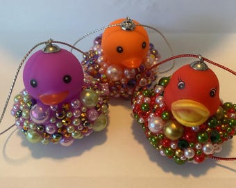 Serie di ornamenti natalizi in gomma a forma di anatra Bubble Fun Auto Sei stato immerso in un regalo con perline e brillantini