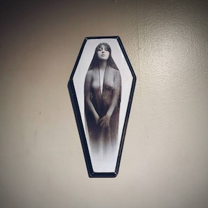 Placa de ataúd (kaloma)