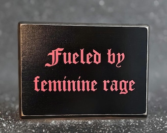 fueled by feminine rage wall plaque