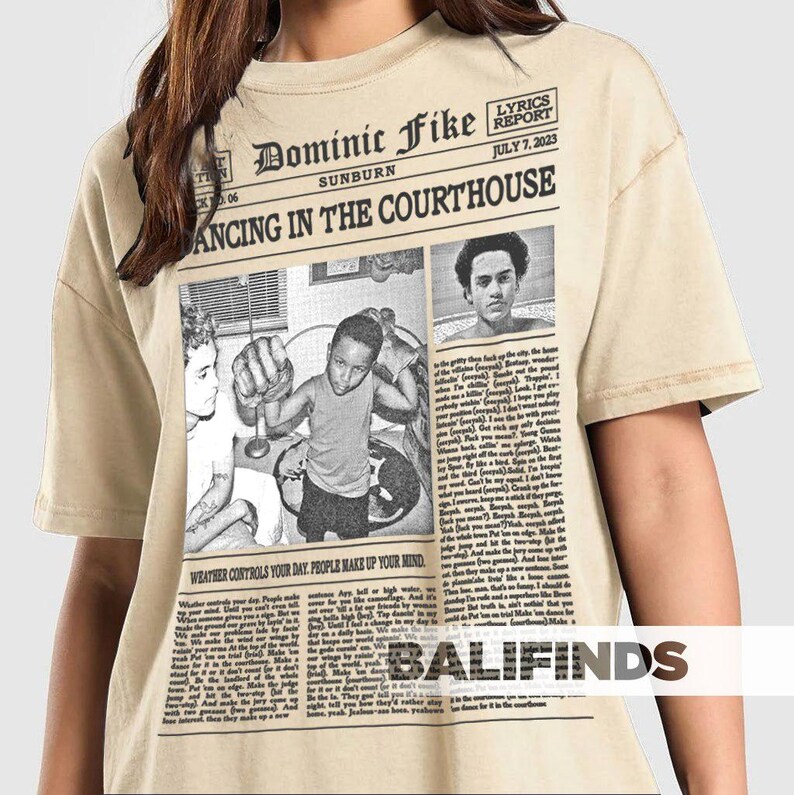 May include: A white ceramic mug with a black handle and the text "But First, Coffee" in a black, handwritten-style font. The mug is on a white surface.