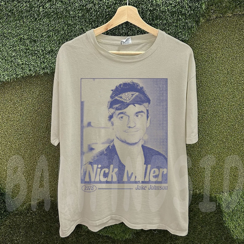 May include: A set of three ceramic mugs with a speckled, matte finish. The mugs are in shades of cream, light brown, and dark brown. Each mug has a simple, minimalist design and a rounded handle.