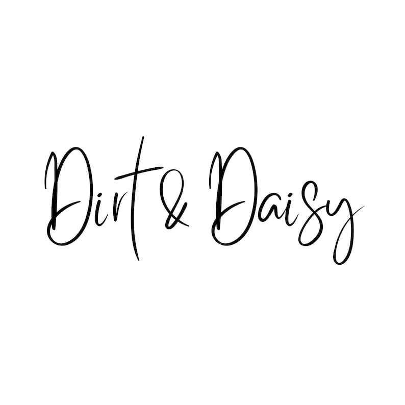 May include: Black and white handwritten text that reads "Dirt & Daisy".