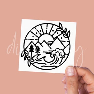 May include: Black and white line art illustration of a sun, mountains, trees, and waves in a circle. The design is reminiscent of a nature scene.