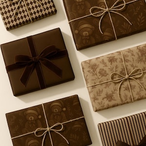 May include: A collection of rectangular gift boxes wrapped in various brown-toned papers featuring patterns of teddy bears in Santa hats, checkered prints, floral motifs, and vertical stripes, tied with jute twine or dark brown velvet ribbons.