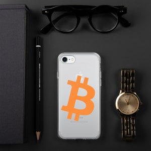 May include: A clear phone case with an orange Bitcoin symbol on the back. The case is designed for an iPhone.