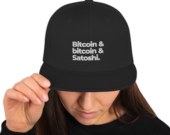 May include: Black baseball cap with white embroidered text that reads "Bitcoin & bitcoin & Satoshi."