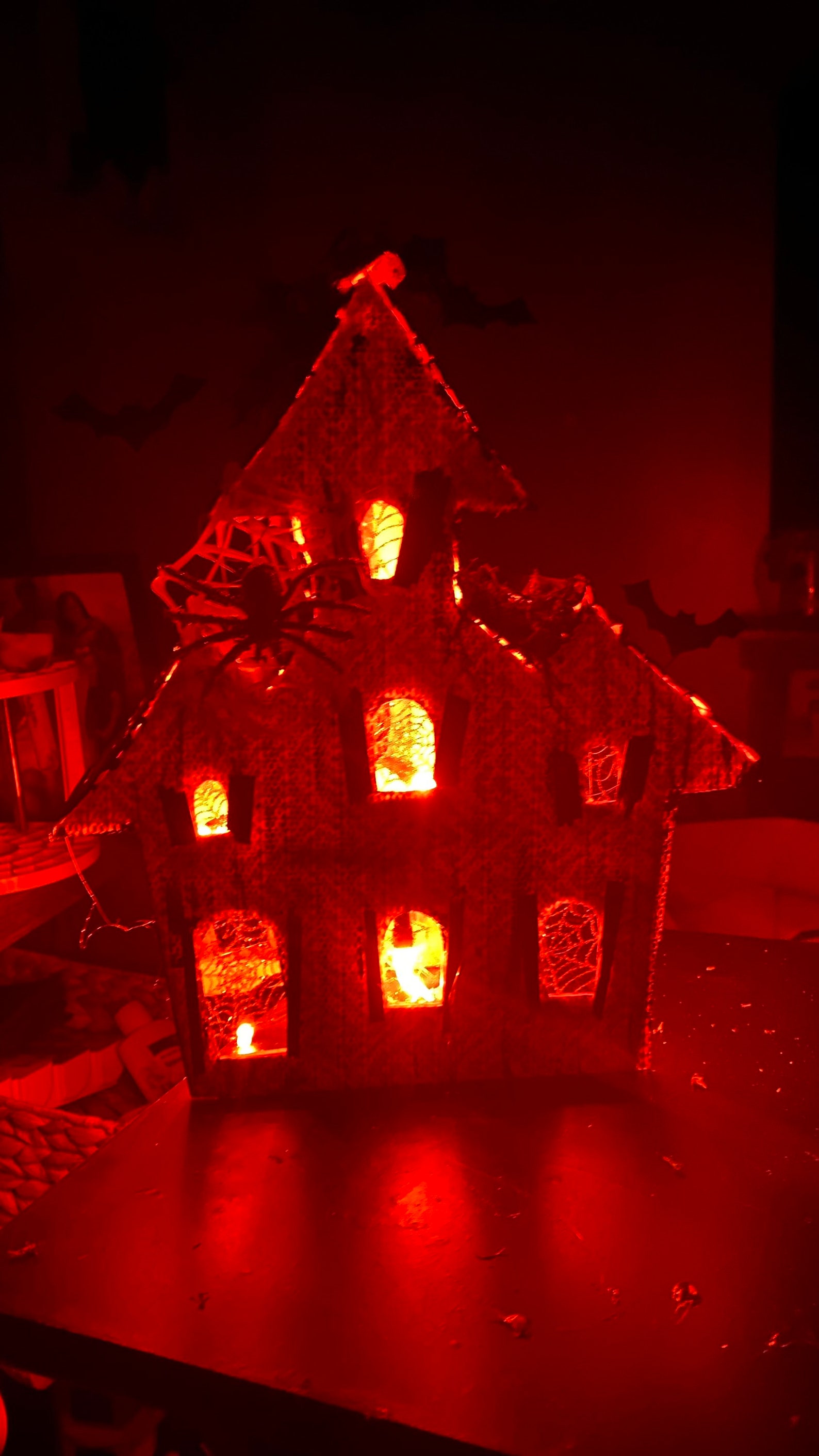 Handmade Halloween haunted house. House lights up with orange Etsy