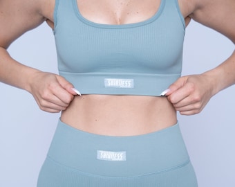 Power and comfort in one: light blue sports set with long leggings and matching sports bra for your active workout