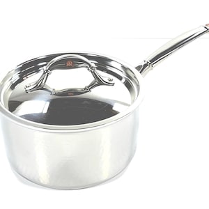 May include: Stainless steel saucepan with a lid. The pot has a long handle and a lid with a decorative handle. The pot is made of shiny, reflective metal and is designed for cooking.