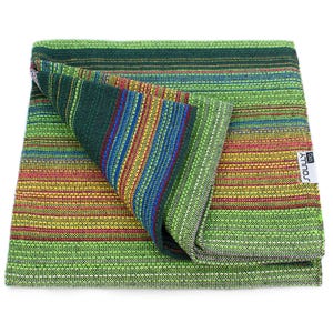 May include: A woven fabric textile featuring a vibrant striped pattern in shades of lime green, yellow, red, and blue. The material has a textured, cross-hatched weave and includes a small white rectangular tag with the text SOULLY tag.