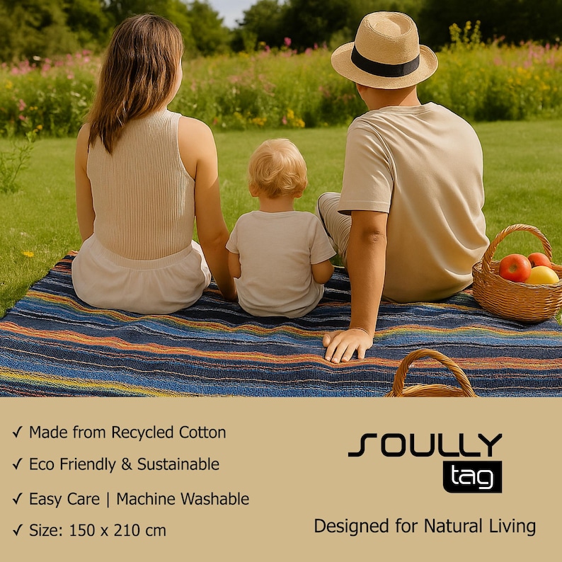 May include: A rectangular woven picnic blanket featuring horizontal stripes in shades of blue, orange, and yellow. The blanket measures 150 x 210 cm and is made from recycled cotton. The text SOULLY tag is printed in black on a tan background.