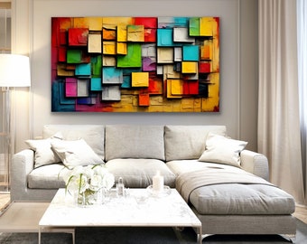 Könnte beinhalten: Abstrakter Kunstdruck mit einem farbenfrohen geometrischen Muster aus Quadraten und Rechtecken in Gelb-, Rot-, Blau-, Grün- und Violetttönen. Der Druck ist gerahmt und hängt an einer Wand über einem weißen Sofa.