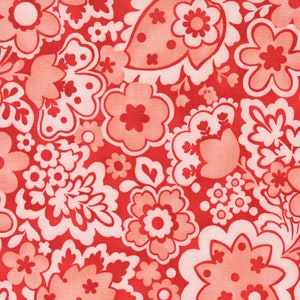 May include: A vibrant floral pattern featuring a repeating design of stylized flowers in shades of red and peach against a red background. The fabric design includes various sizes and shapes of flowers, creating a lively and colorful textile.