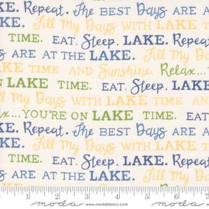 May include: White fabric with a repeating pattern of blue, green, and yellow text that says "KE. Repeat. The BEST Days ARE A KE. Fill my Days WITH LAKE T TIME. EAT. Sleep. LAKE. Repeat 5 ARE AT THE LAKE. Fill my Do KE TIME AND Sunshine Relax... LAKE TIME. EAT. Sleep. LAKE I My Days WITH LAKE TIME AN x... YOU'RE ON LAKE TIME. EAT SE. Repeat. The BEST Days ARE A KE. Fill My Days WITH LAKE T TIME. EAT. Sleep. LAKE. Repeat SARE AT THE LAKE. Fill my Do"