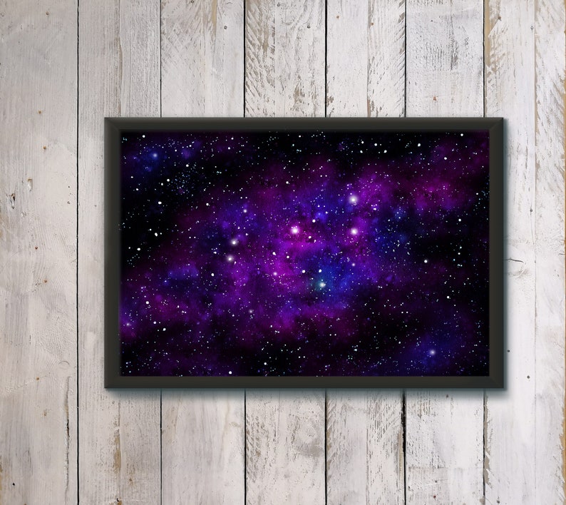 May include: A framed print of a dark purple and blue nebula with white stars. The nebula is a swirling cloud of gas and dust in space.