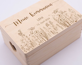 May include: A wooden box with a floral design and the text "Meine Kommunion LENI 13. April 2024" engraved on the lid.