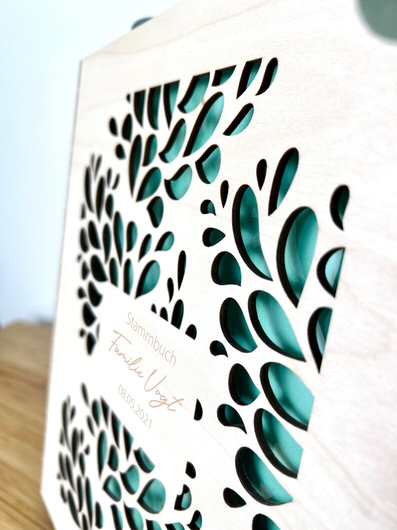Stammbuch mit Familienname personalisiert mit floralem Muster