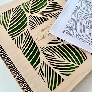 Stammbuch mit Familienname personalisiert mit floralem Muster