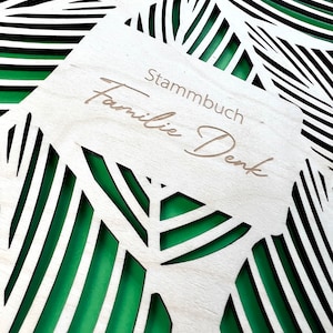 Stammbuch mit Familienname personalisiert mit floralem Muster