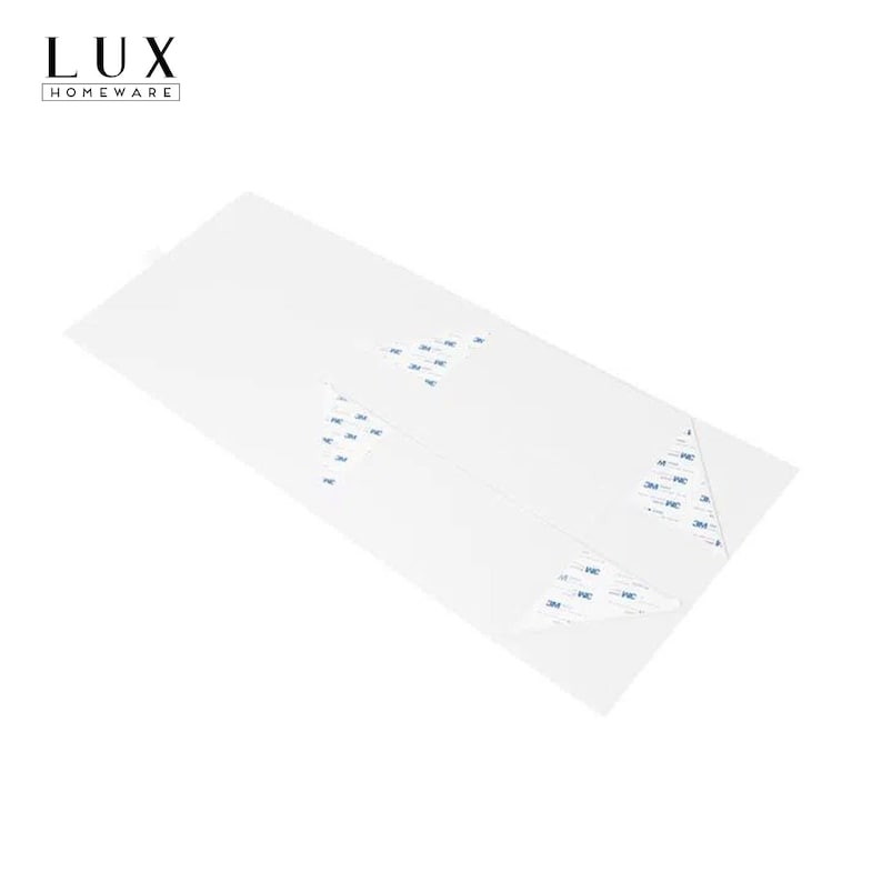 K&ouml;nnte beinhalten: Ein wei&szlig;es rechteckiges Produkt mit blauem Klebeband an den Ecken. Das Produkt tr&auml;gt den Text "LUX HOMEWARE" in der oberen linken Ecke.