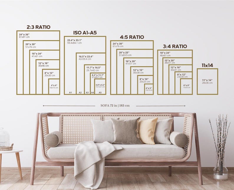 May include: A wall display showcasing various print sizes and ratios, including 2:3, ISO A1-A5, 4:5, 3:4, and 11x14. The sizes are displayed in inches and centimeters. A sofa, 72 inches or 183 cm wide, sits below the display.