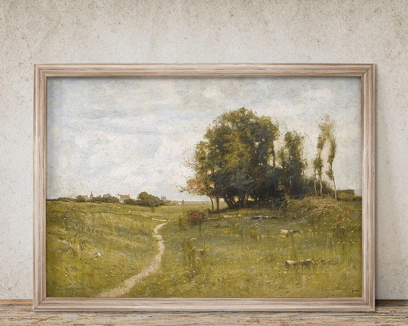 May include: A framed painting depicting a rural landscape with a winding path leading to a cluster of trees in the distance. The sky is a soft blue with white clouds, and the field is a vibrant green.
