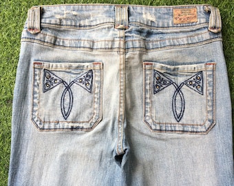 Vaqueros acampanados de tiro bajo estilo años 2000, denim elástico desgastado, talla 28