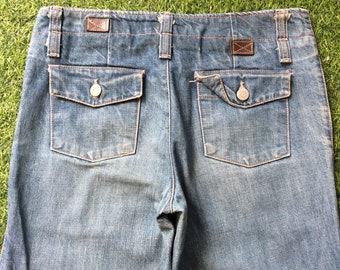 Japanese medium light blue wash 2000’s grunge style low-rise super wide leg signature rise boot jeans