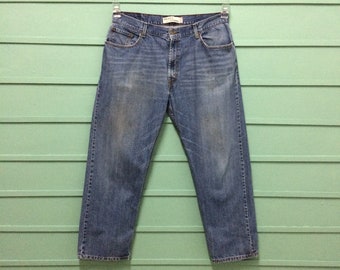 Jean Levi's 559 vintage : denim délavé léger effet vieilli, coupe décontractée (W38 L30)