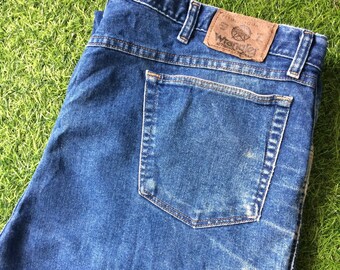 Vintage Wrangler Western Jeans: Distressed Faded Denim, Size 42