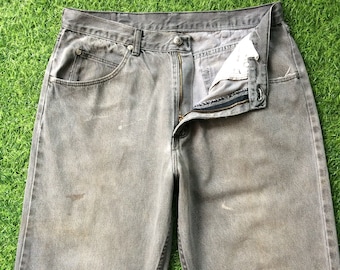 Pantalones vaqueros Wrangler vintage estilo western, desgastados y desteñidos en negro, fabricados en EE. UU. (W31 L30)