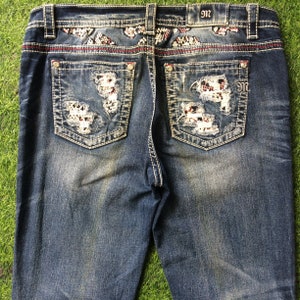 Miss Me medium blue wash 2000’s grunge style low-rise embellished embroidered tapered fit jeans