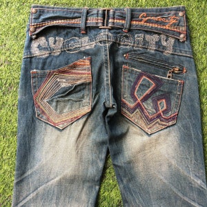 Size 27 Distressed Low Rise Bootcut Jeans Embroidered Pocket W29 L31 Wide Leg Faded Flare Denim Jeans, Waist 29&quot;