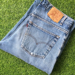 Size 35 Vintage Distressed Levis 560 Ripped Jeans W35 L34 Light Wash Denim Loose Fit Tapered Leg Jeans Plus Size Mom Jeans Waist 35"